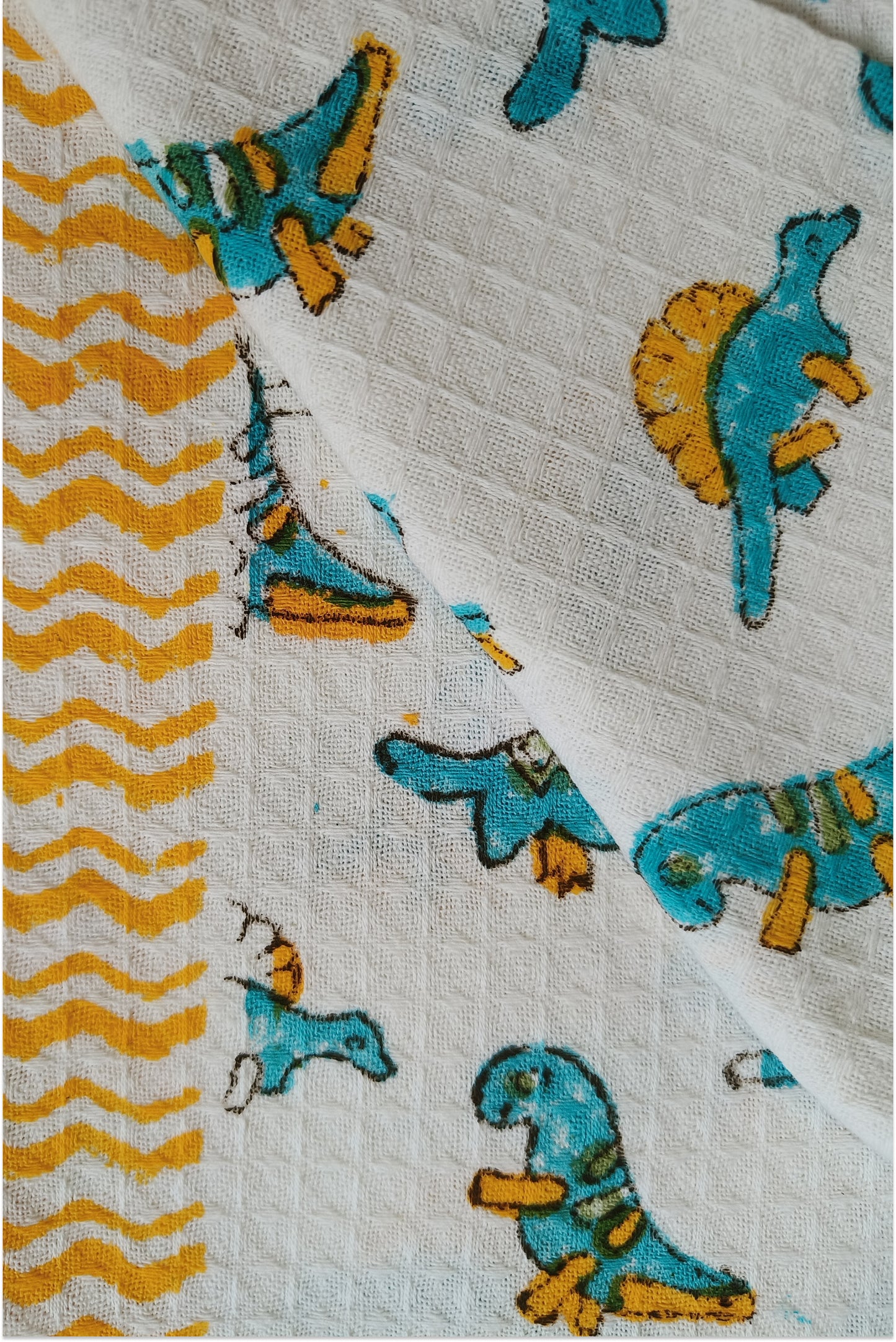 Dinosaur themed block printed waffle bath towel