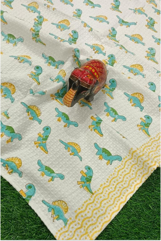 Dinosaur themed block printed waffle bath towel