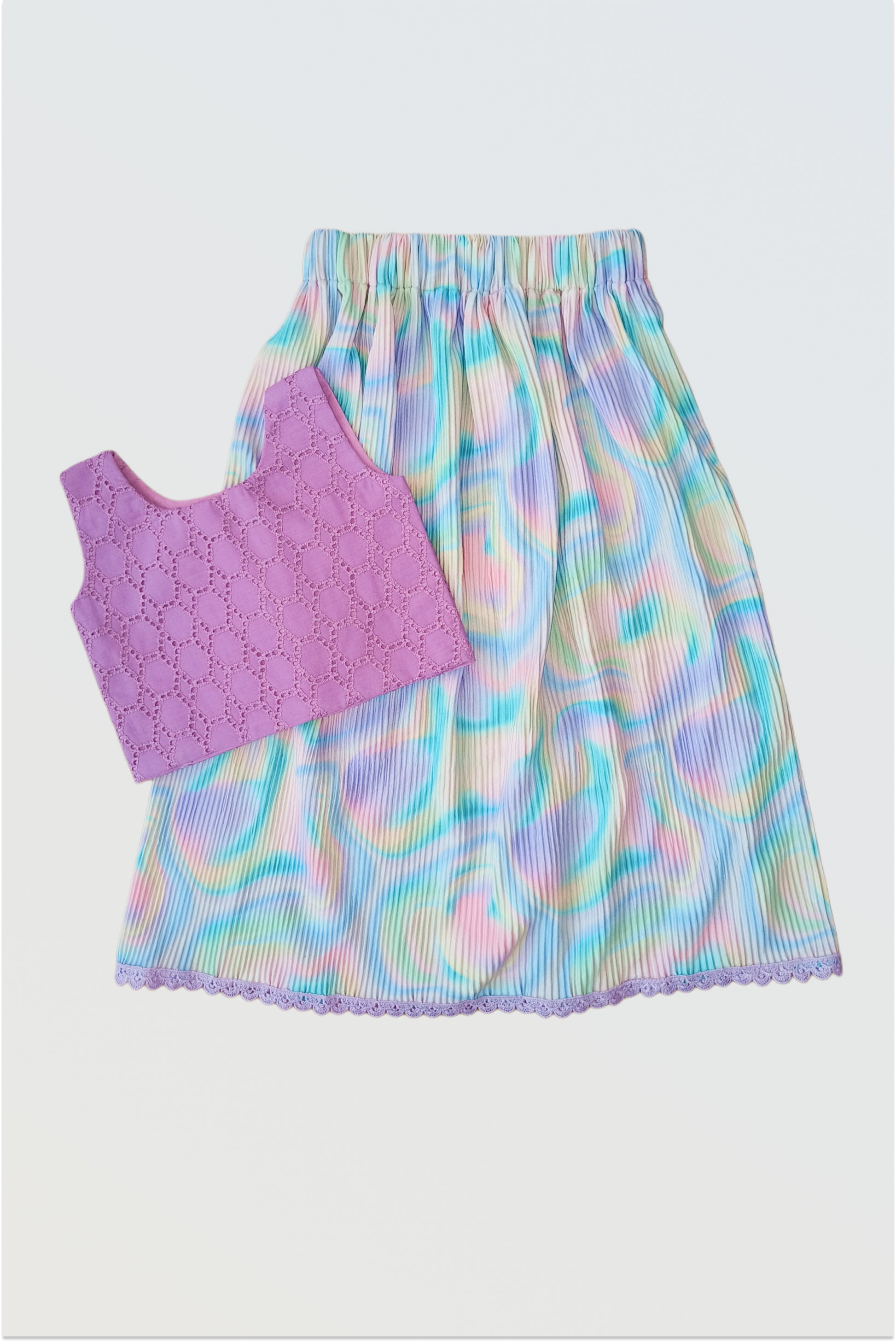 Full front view of accordion pleated colourful holi lehanga with hakoba choli set for girls