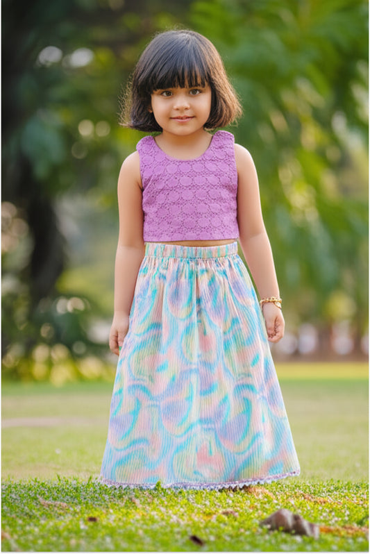 Girl wearing accordion pleated colourful holi lehanga set with hakoba cotton choli - colorful ethnic wear