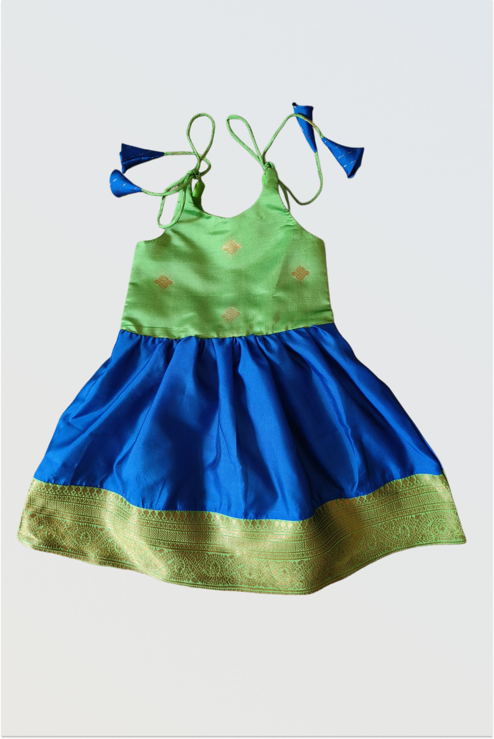 Blue green art silk tie-up frock for baby girls with gathered design and cotton lining