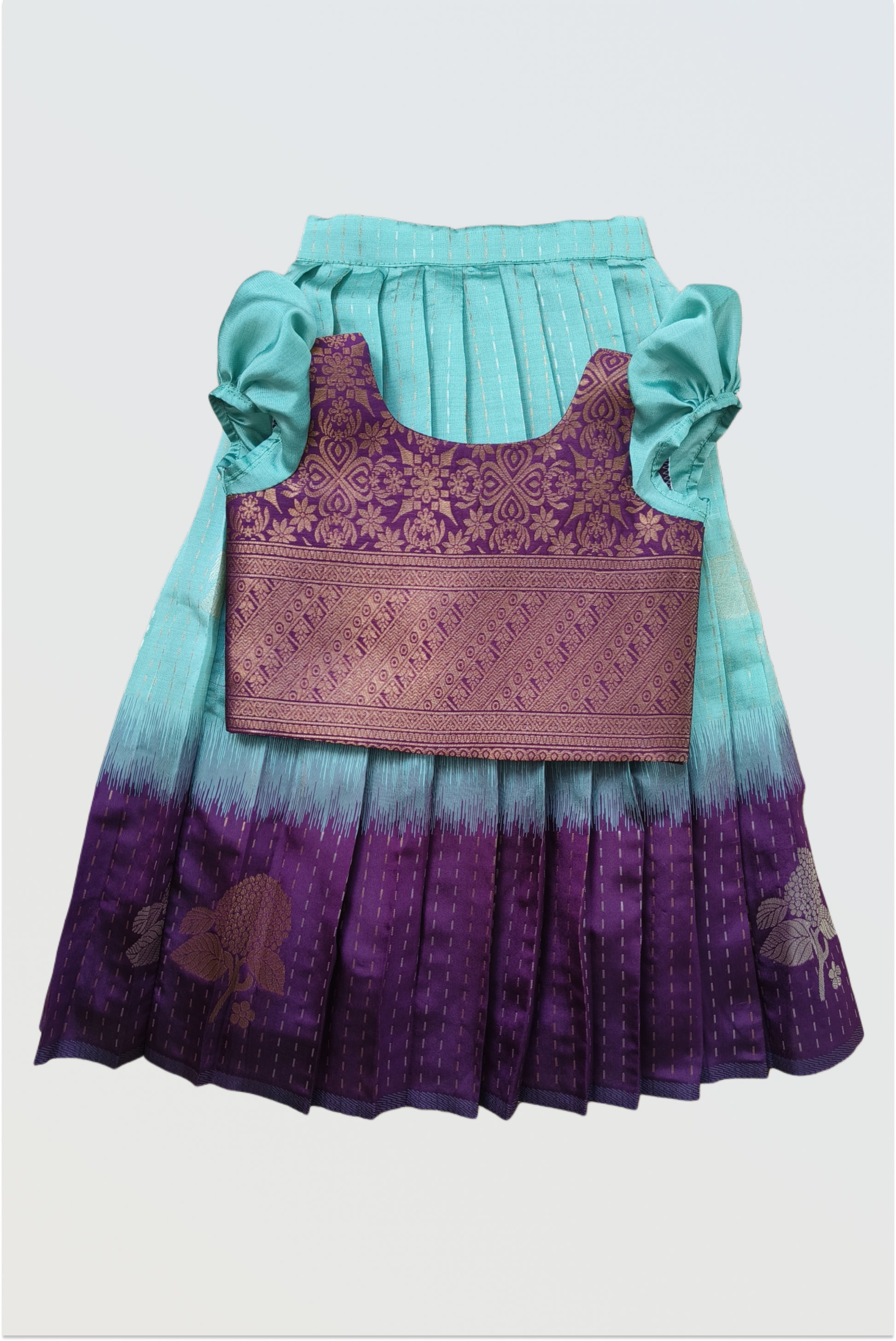 Girl wearing blue purple pattu pavadai set - South Indian traditional art silk dress with short sleeves