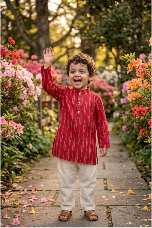 Boy wearing red ikat kurta pyjama set for boys