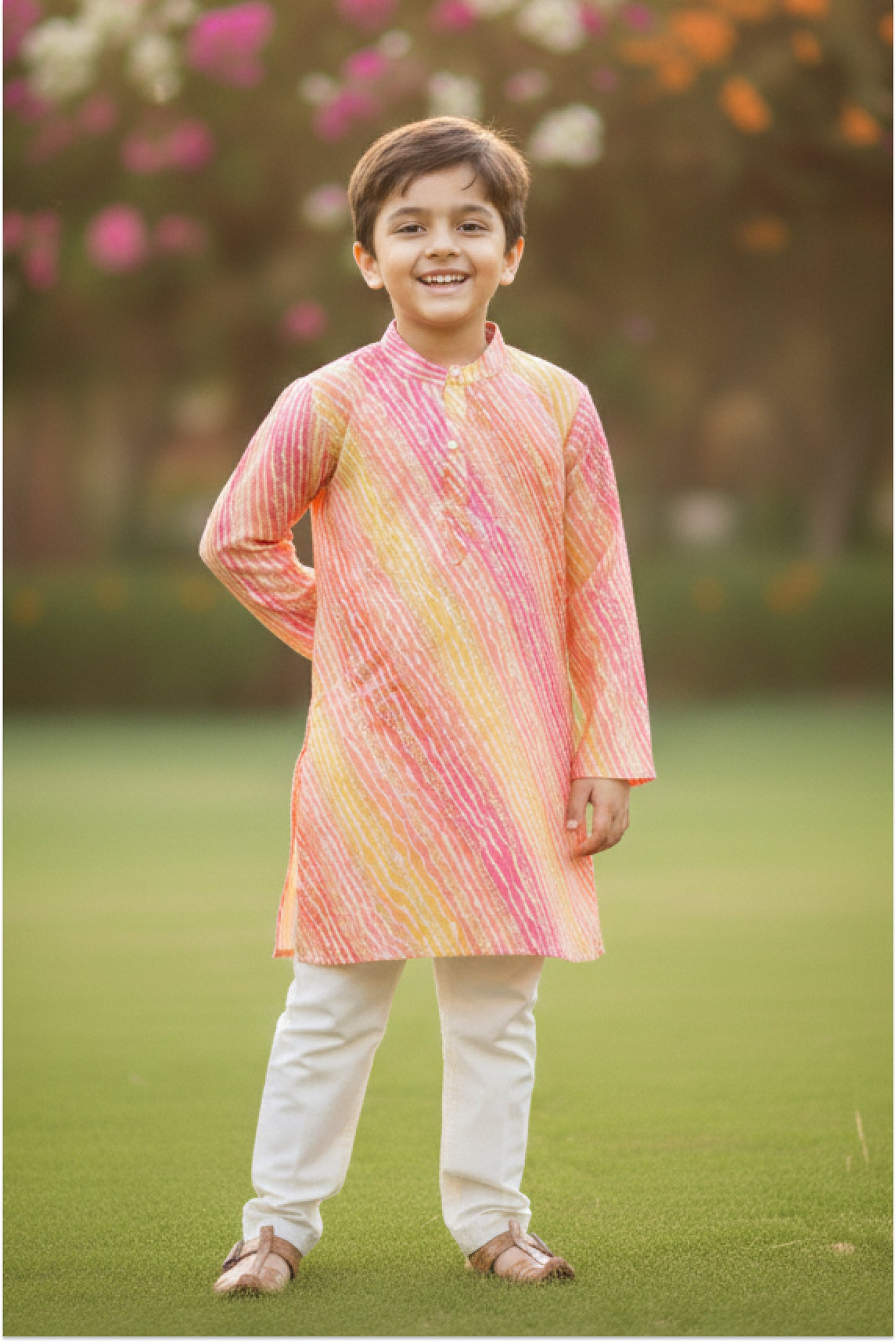 Boy wearing holi outfit multicolor leheriya print kurta with white pajama — kids ethnic festive wear