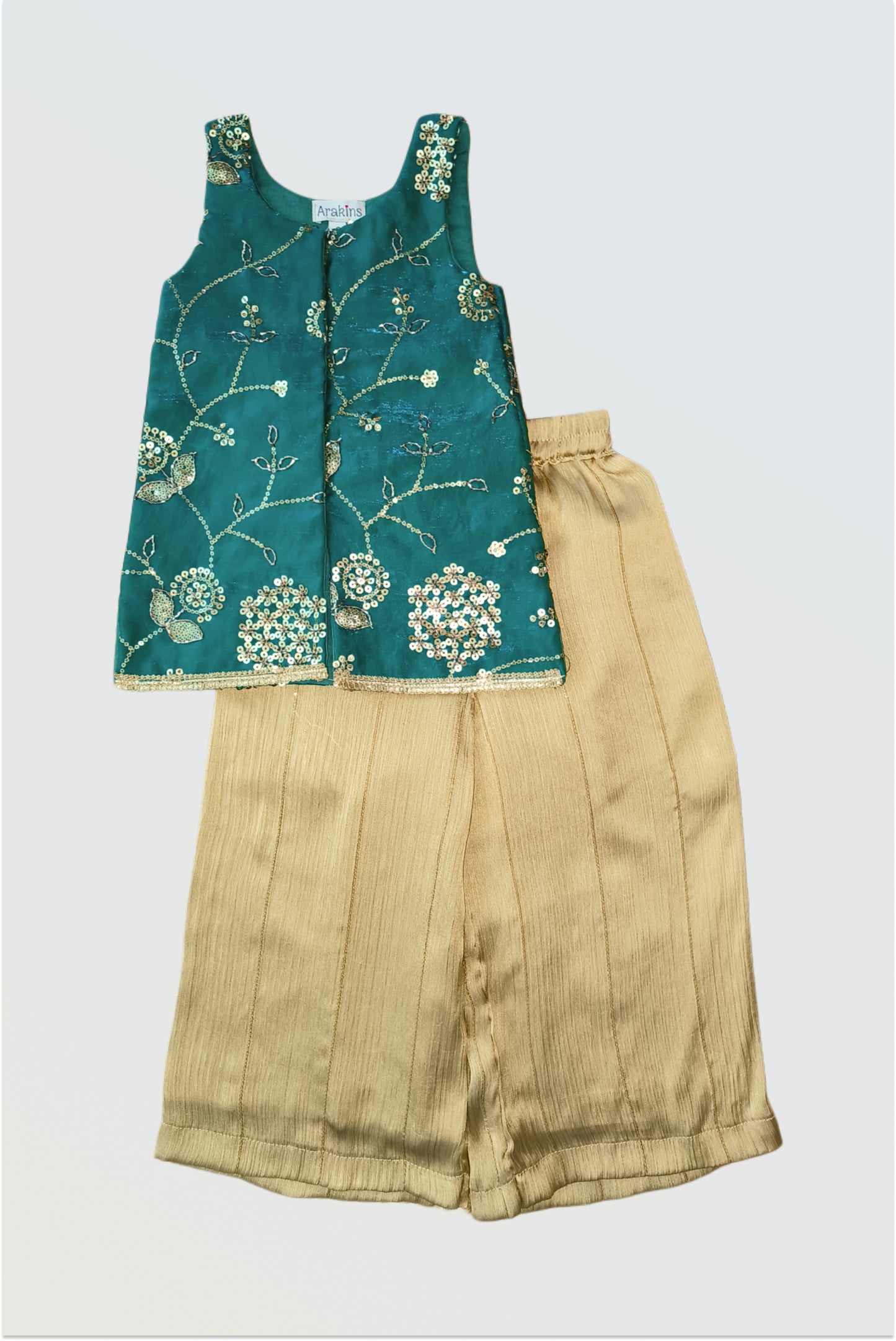 Peacock green sequin palazzo set flat lay showing space silk top and satin pants