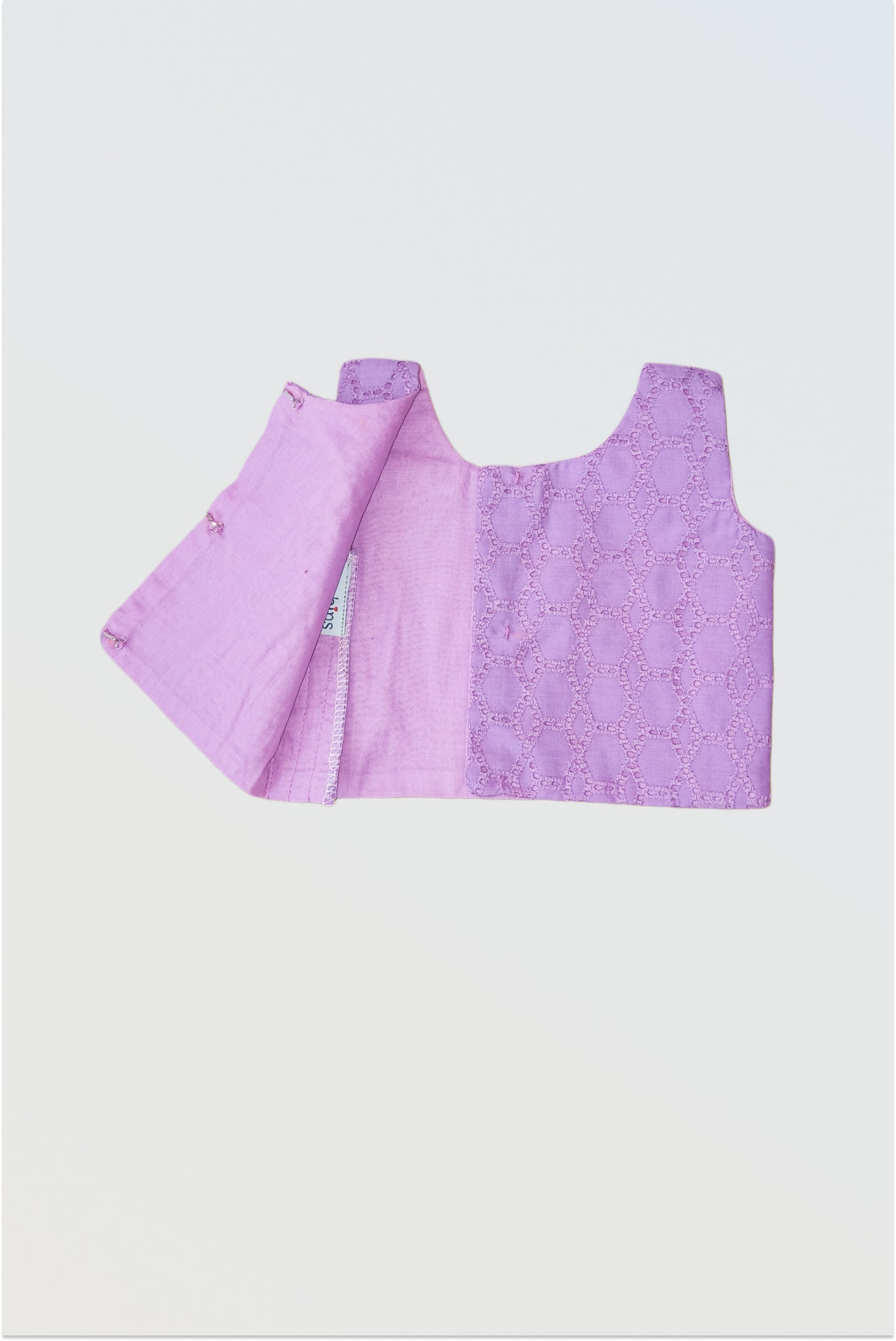 Back view of hakoba cotton choli showing hook closure and textured fabric detai