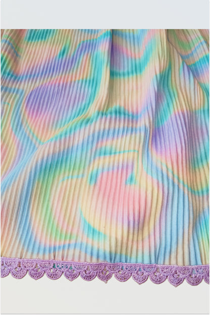 Close up of hakoba cotton fabric showing traditional textured weave pattern colourful holi lehanga