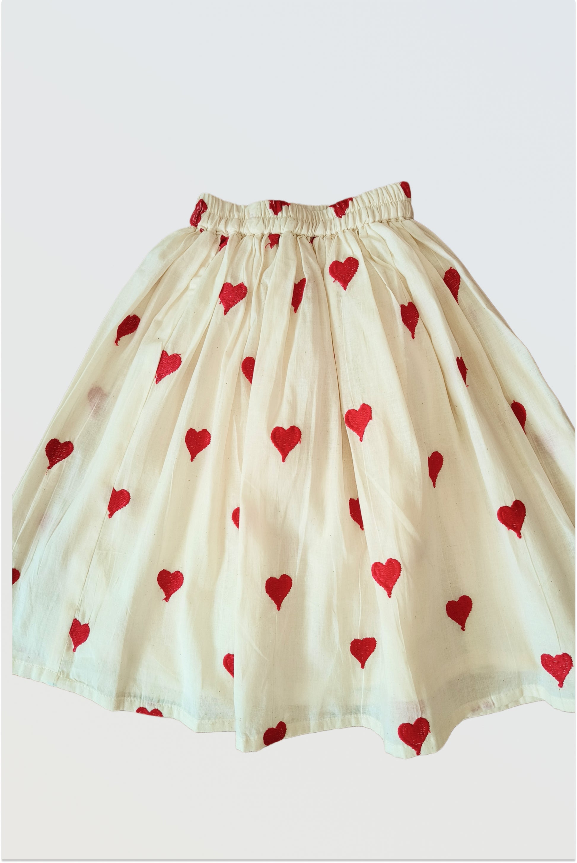Off-white cotton lehanga with embroidered heart motifs detail
