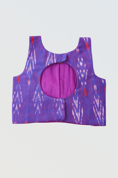 Back view of ikat purple blouse with decorative design and hook closure