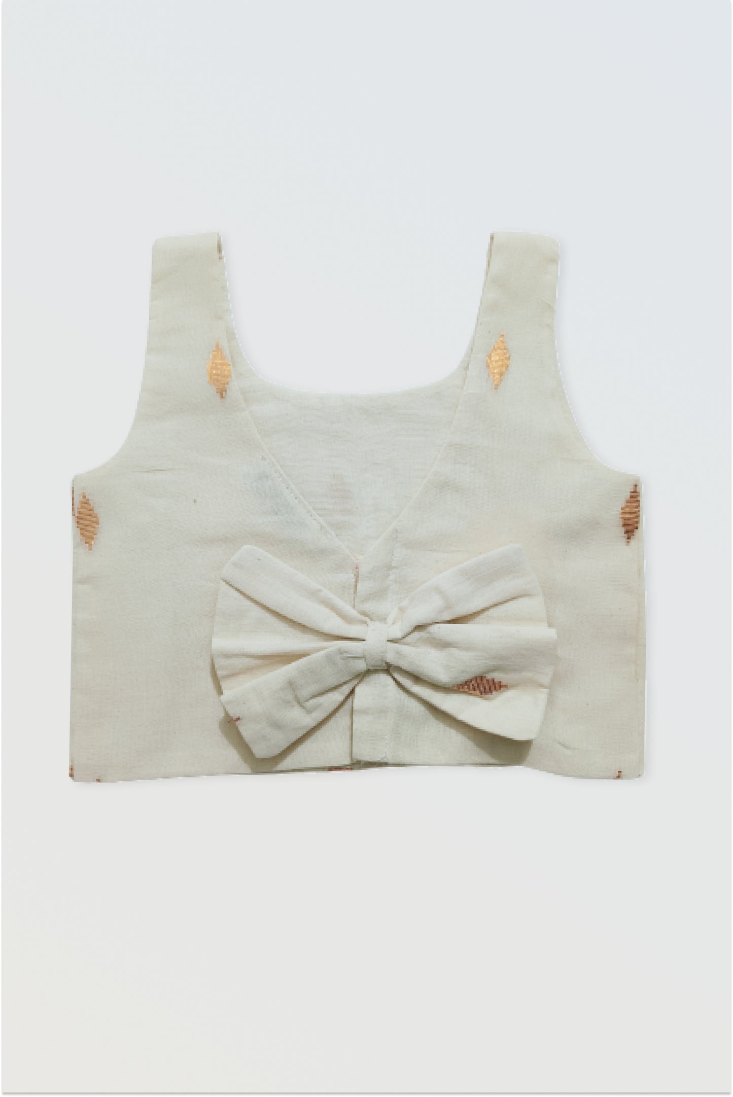 Back view of kasavu choli showing adorable bow detail and hook closure