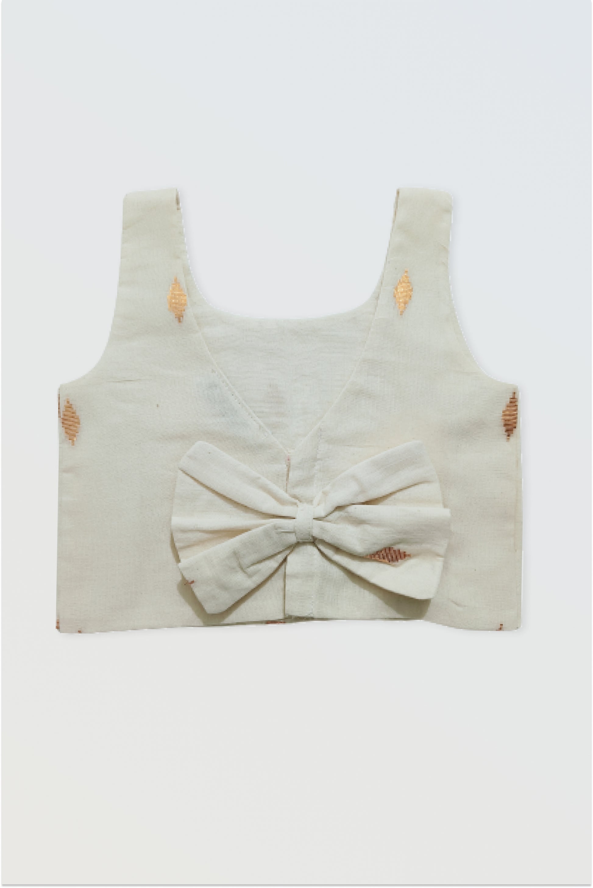 Back view of kasavu choli showing adorable bow detail and hook closure