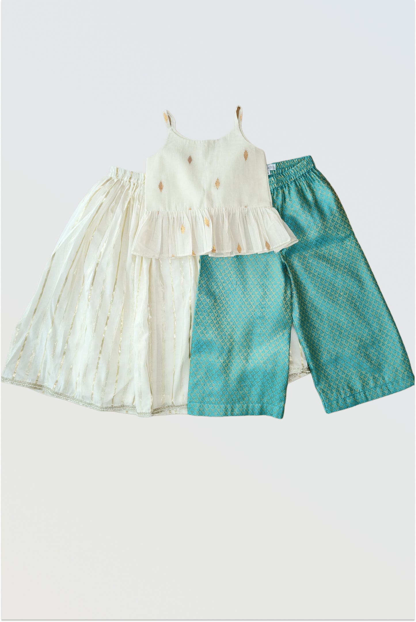 Kerala kasavu lehanga and brocade palazzo combo set flat lay showing all 3 pieces - top, skirt, and pants