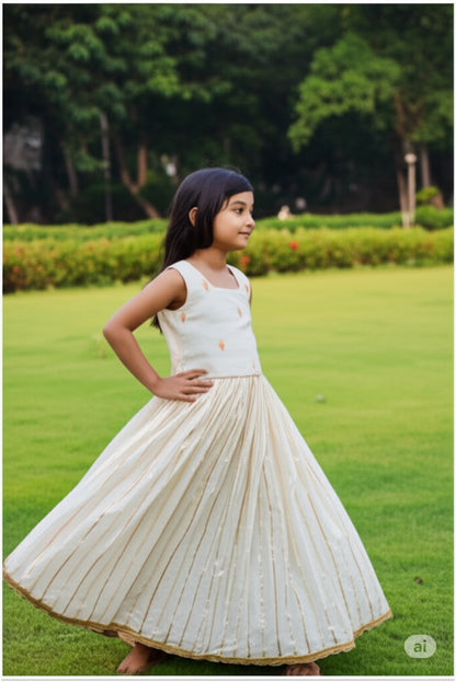 Girl wearing traditional kasavu lehanga set with bow back choli - Kerala Onam outfit