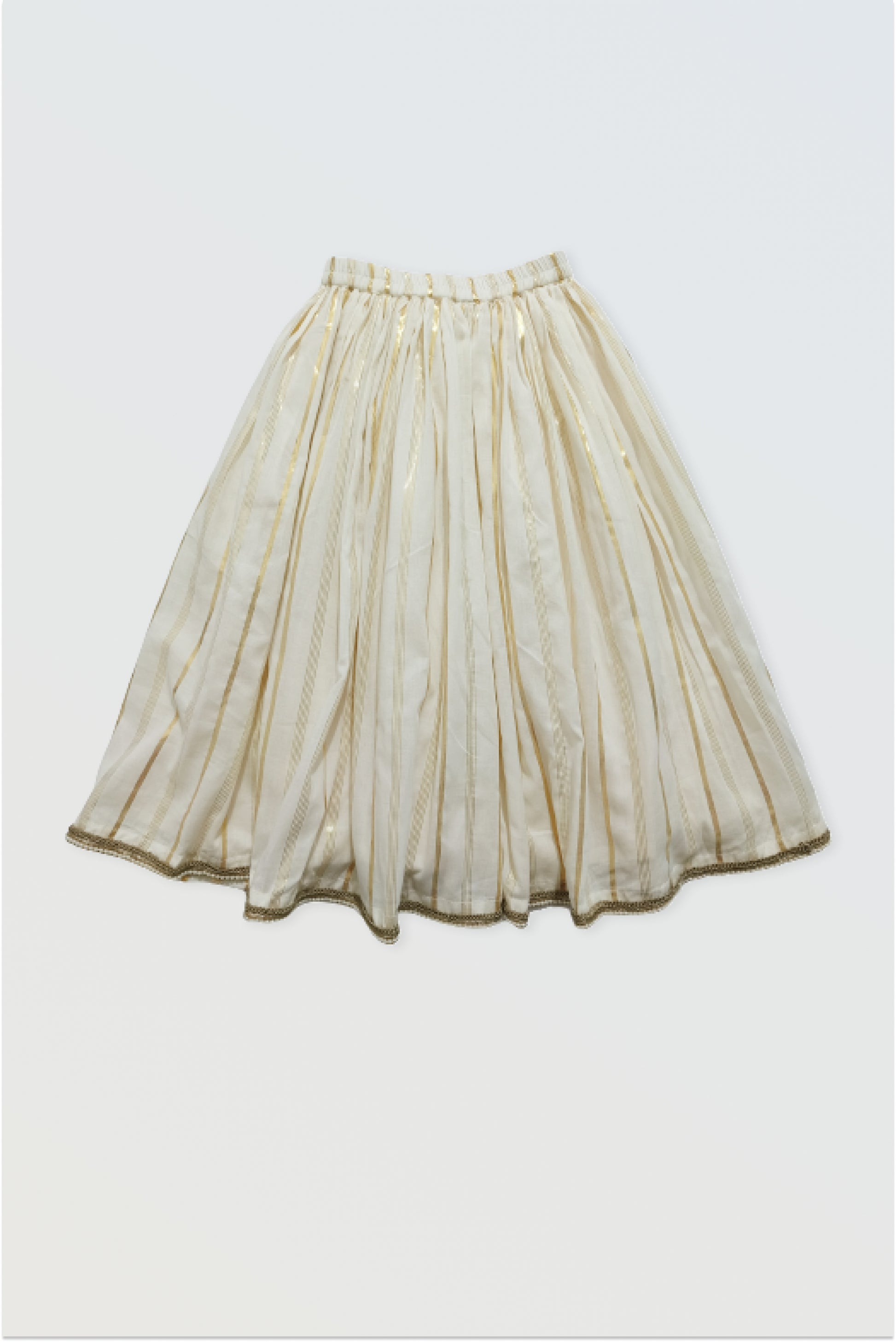 Kasavu lehanga skirt with full flare showing golden border and pearl lace hem detail