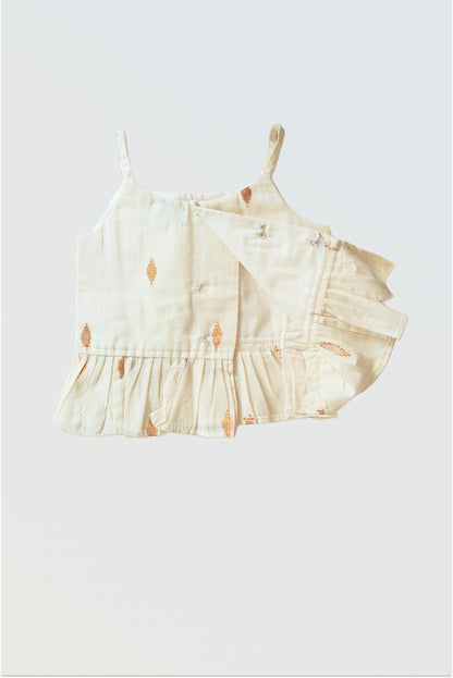 Close up of Kerala kasavu peplum top with golden lurex stripes and frilled hem detail