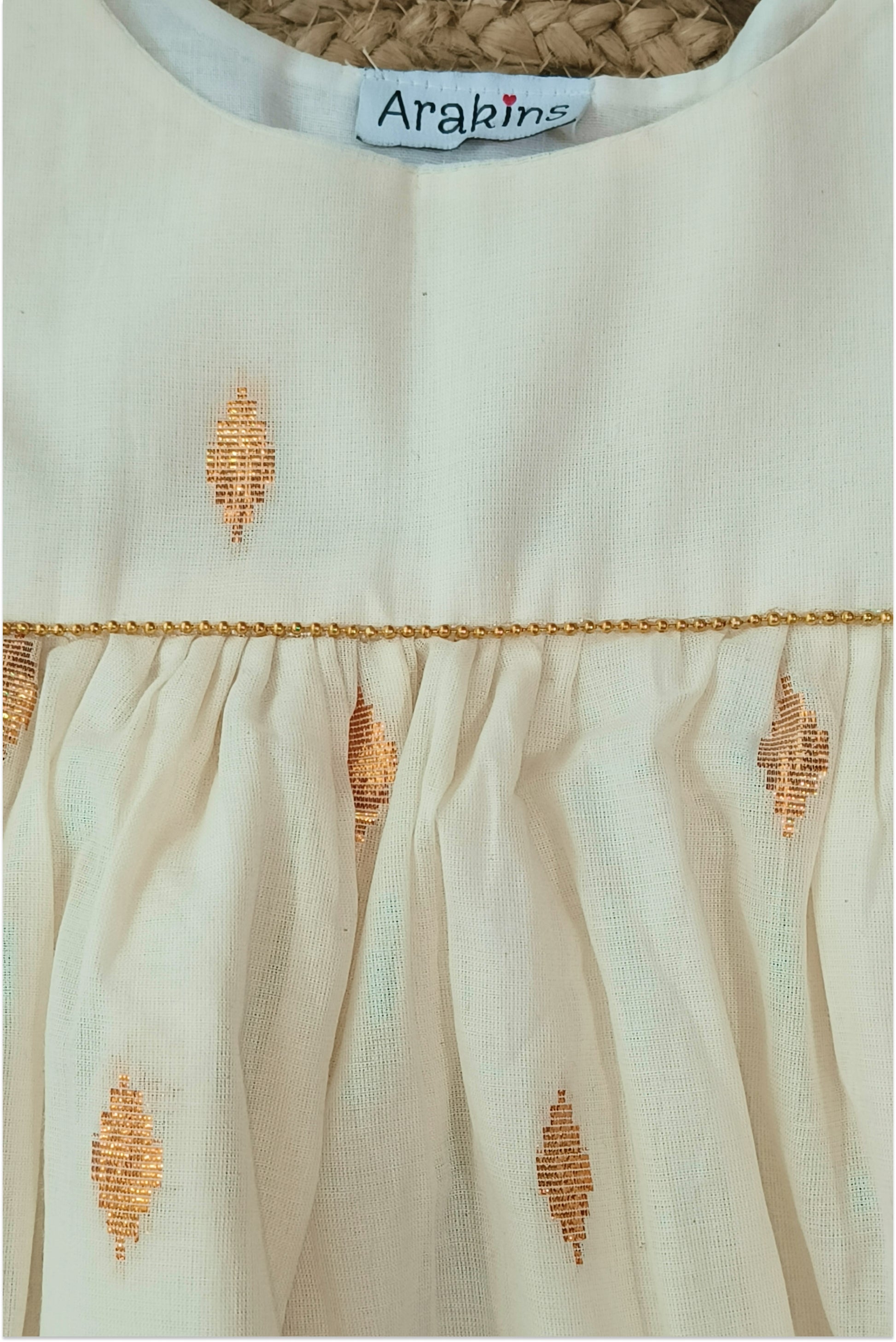 Kasavu traditional Kerala dress with tie ups for girls and golden bead work
