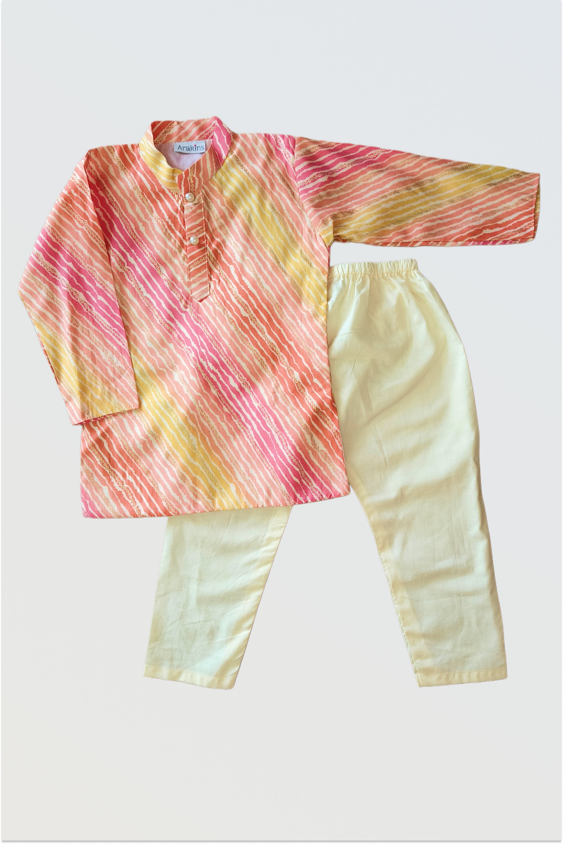 Lehariya print kurta with golden foil accents flat lay showing vibrant yellow orange pink colors