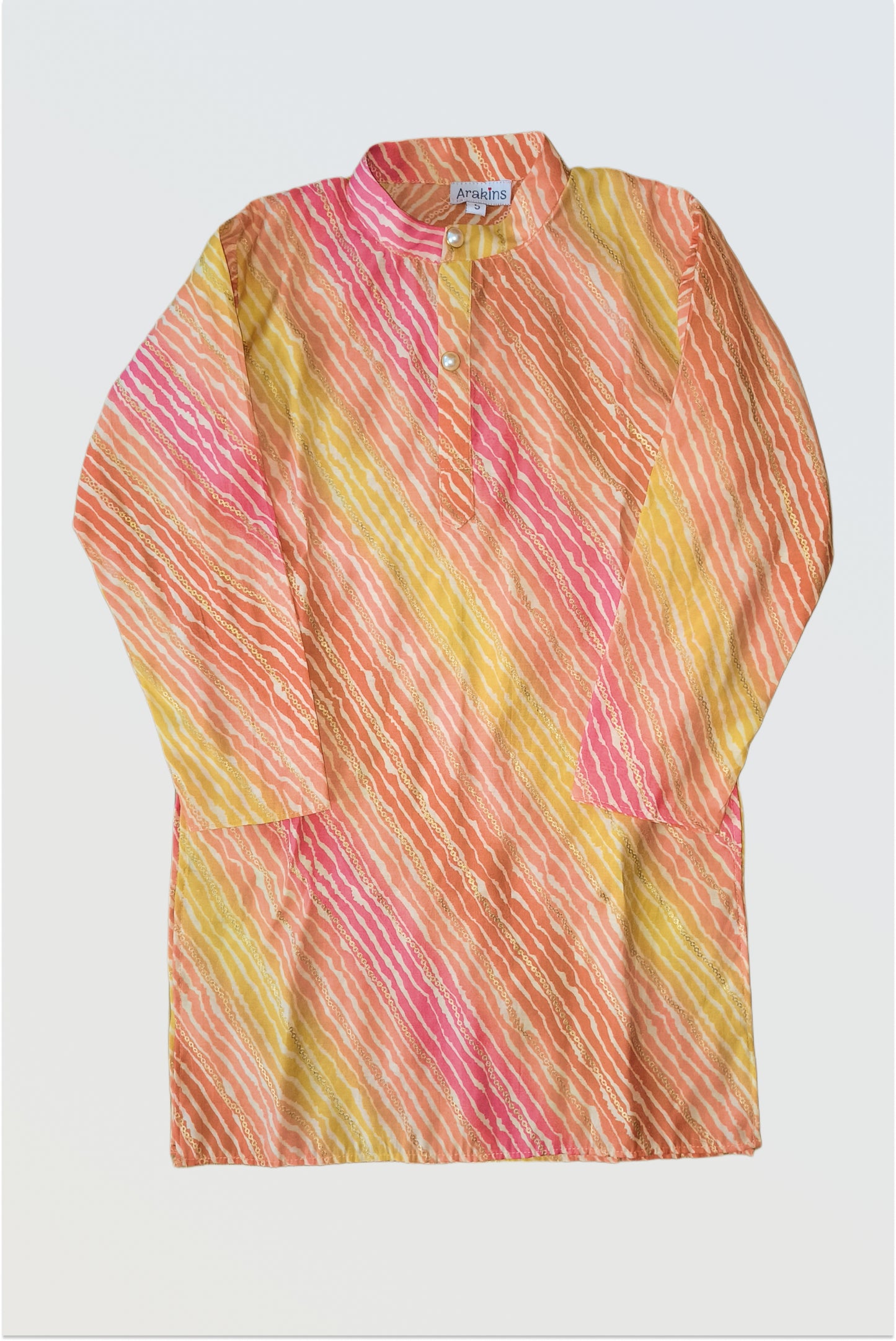 Close up of traditional lehariya pattern with golden foil print detail on kurta