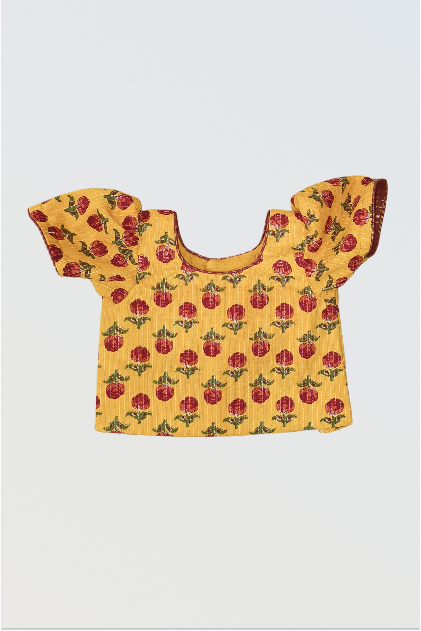 Mustard yellow block printed choli front view with kantha embroidery work