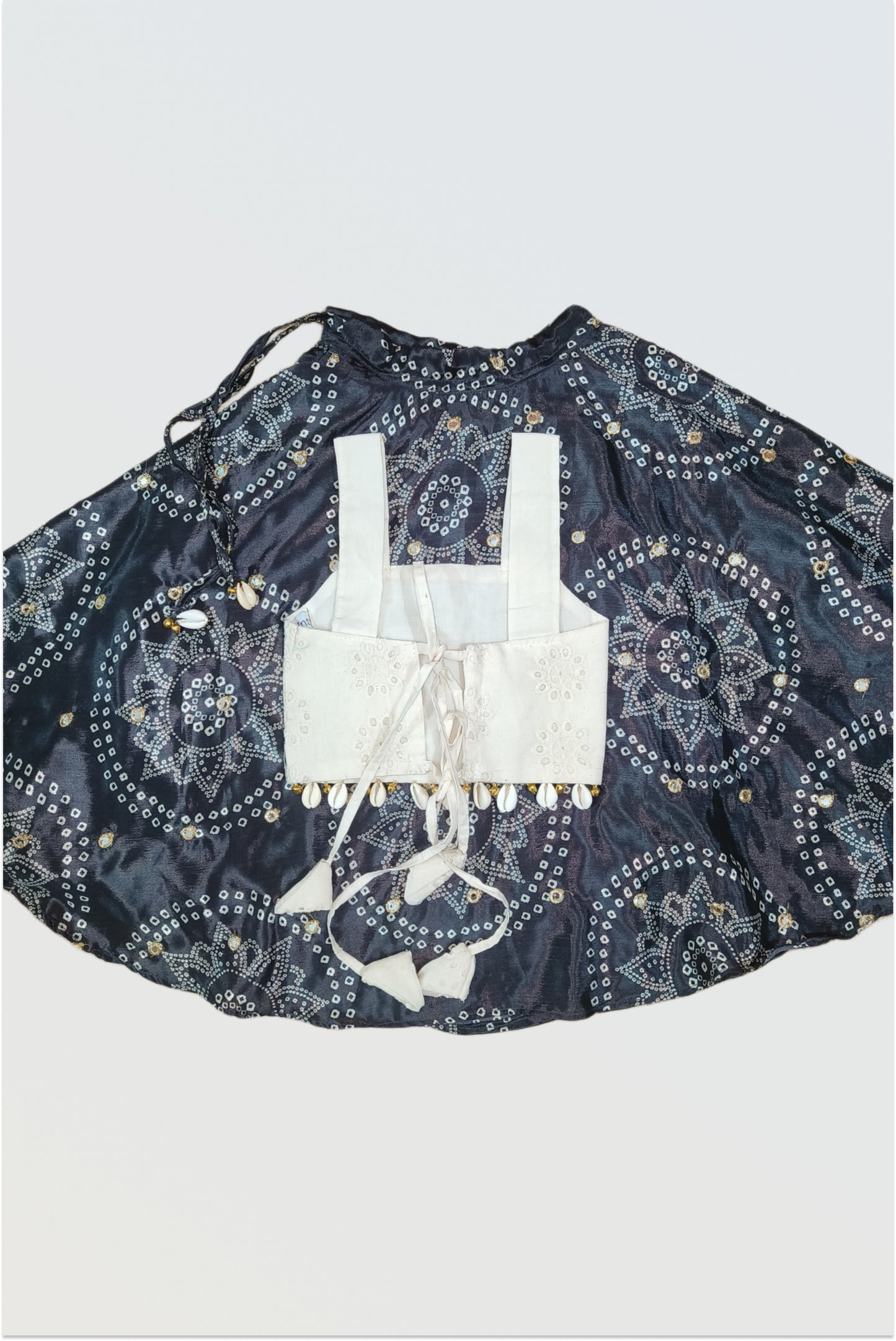 Off-white hakoba blouse with ghungroos at hem - back view showing tie-up construction
