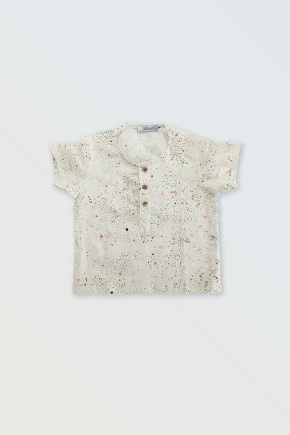 Front view of white paint dots button shirt for kids - unisex summer casual wear