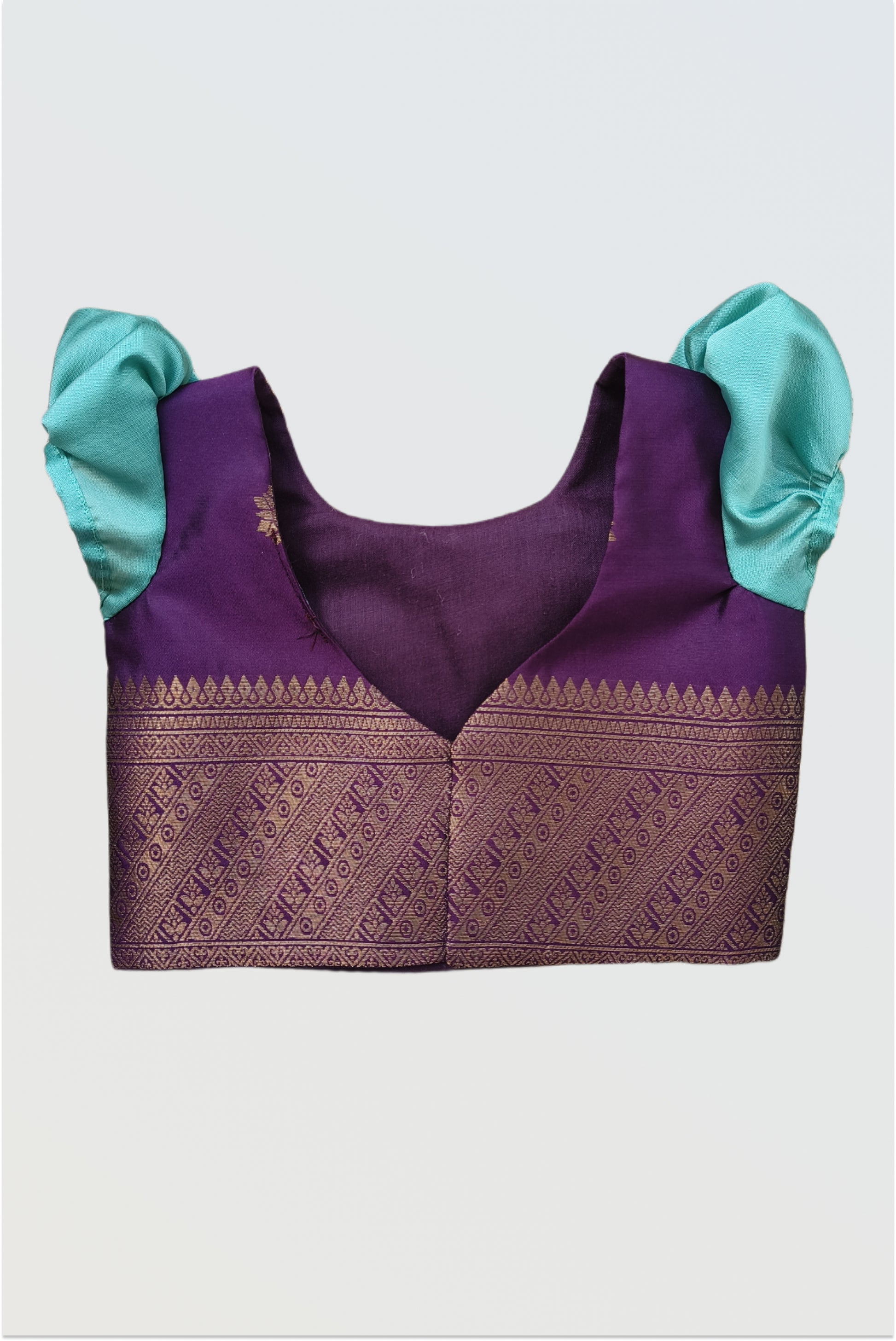 Back view of pattu pavadai blouse showing hook closure and short sleeve construction