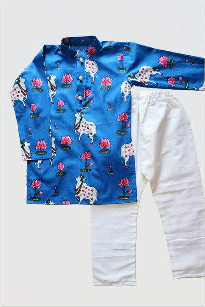 Pichwai printed design detail showing traditional Rajasthani motifs on blue kurta
