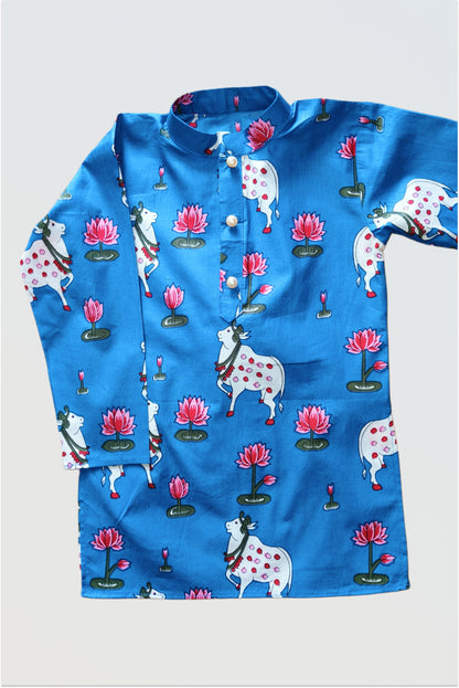 Close up of pichwai printed kurta pyjama set for boys showing traditional Rajasthani art patterns - cow, flowers