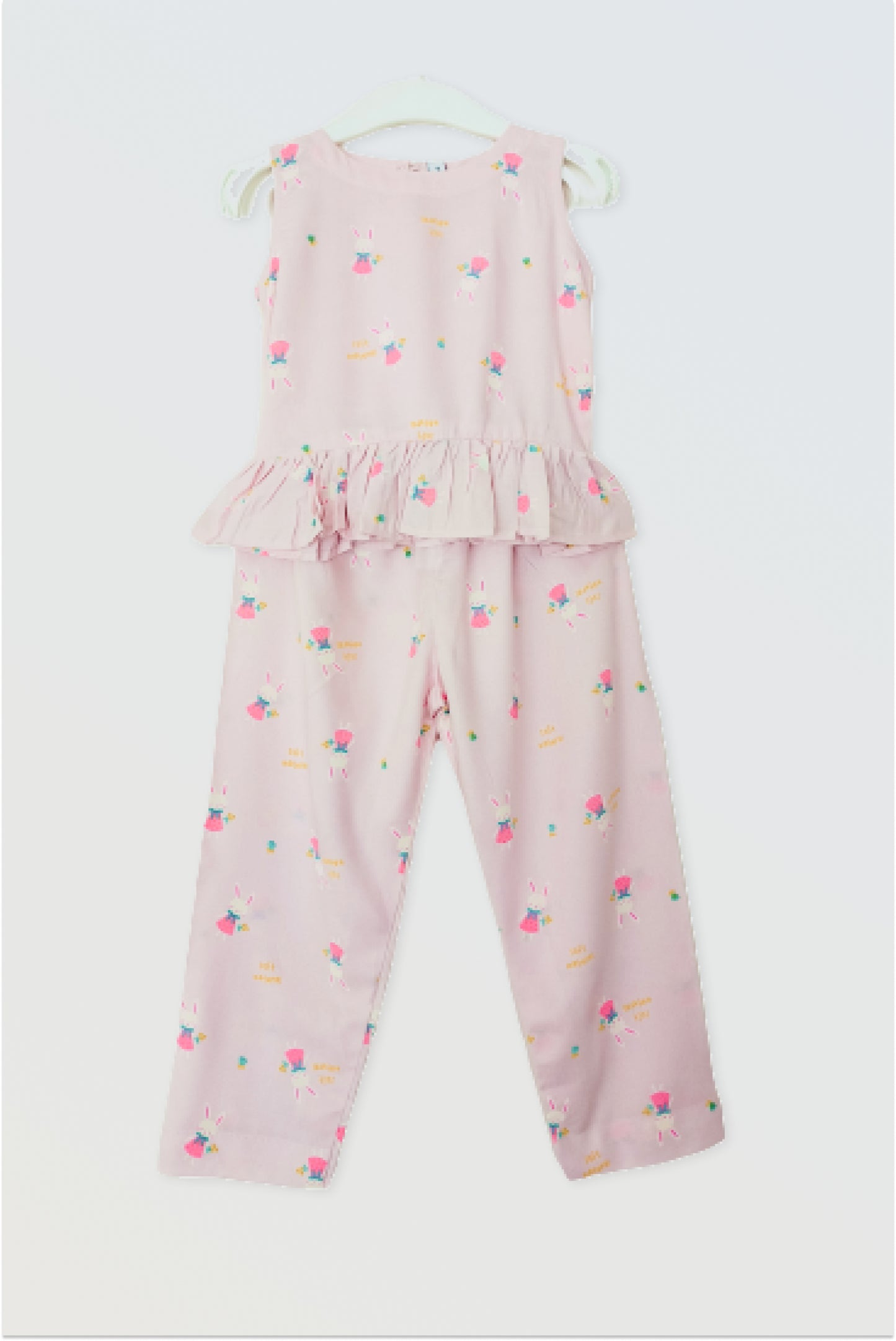 Pink co-ord set flat lay showing sleeveless top and full length pants