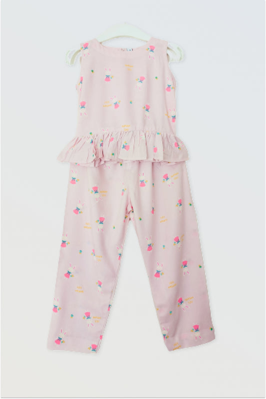 Pink co-ord set flat lay showing sleeveless top and full length pants