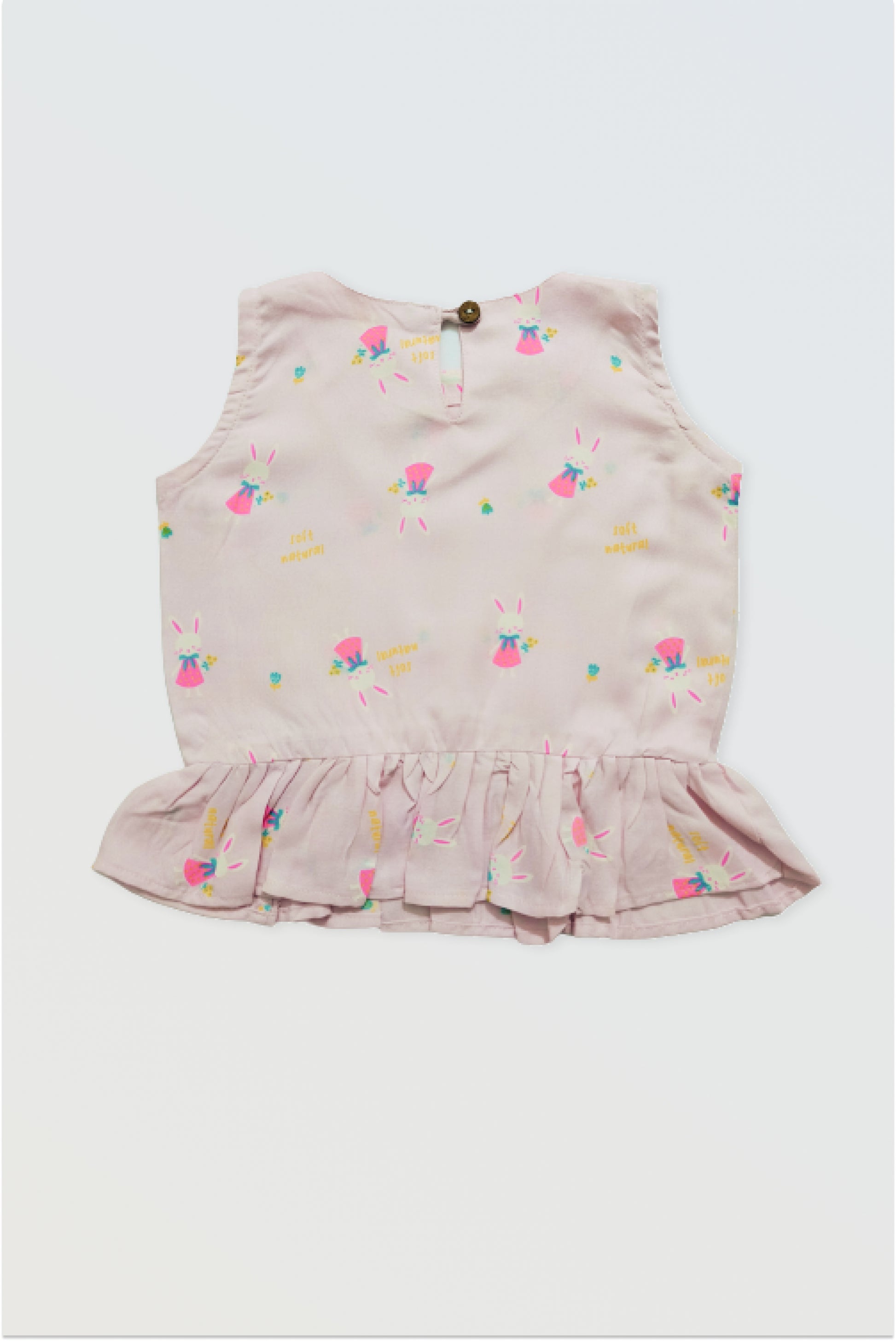 Back view of pink ruffle top showing button closure detail