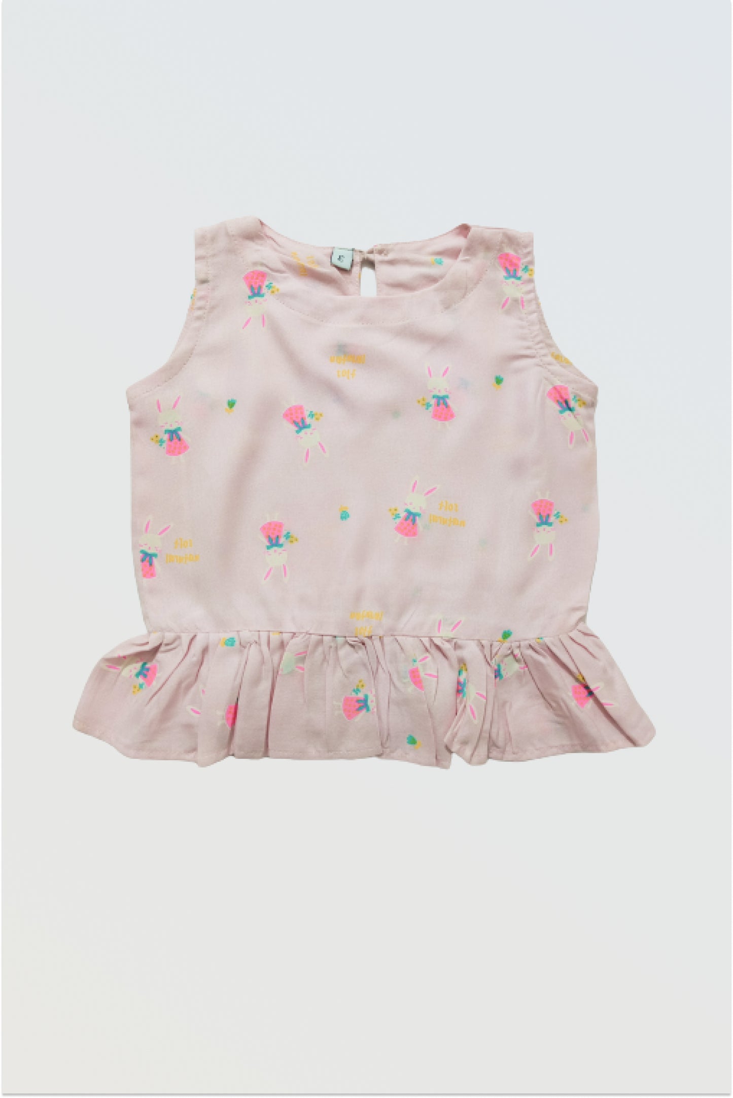 Pink ruffle top front view showing feminine ruffle detail and button back closure