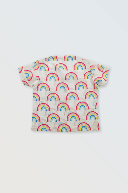Back view of rainbow striped kids shirt showing colorful summer pattern