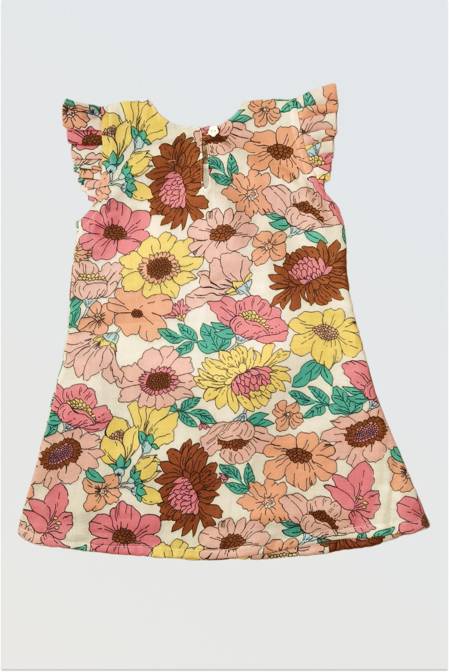 Summer Bloom vintage floral dress for girls with cream base and pink yellow brown botanical print with flutter sleeves