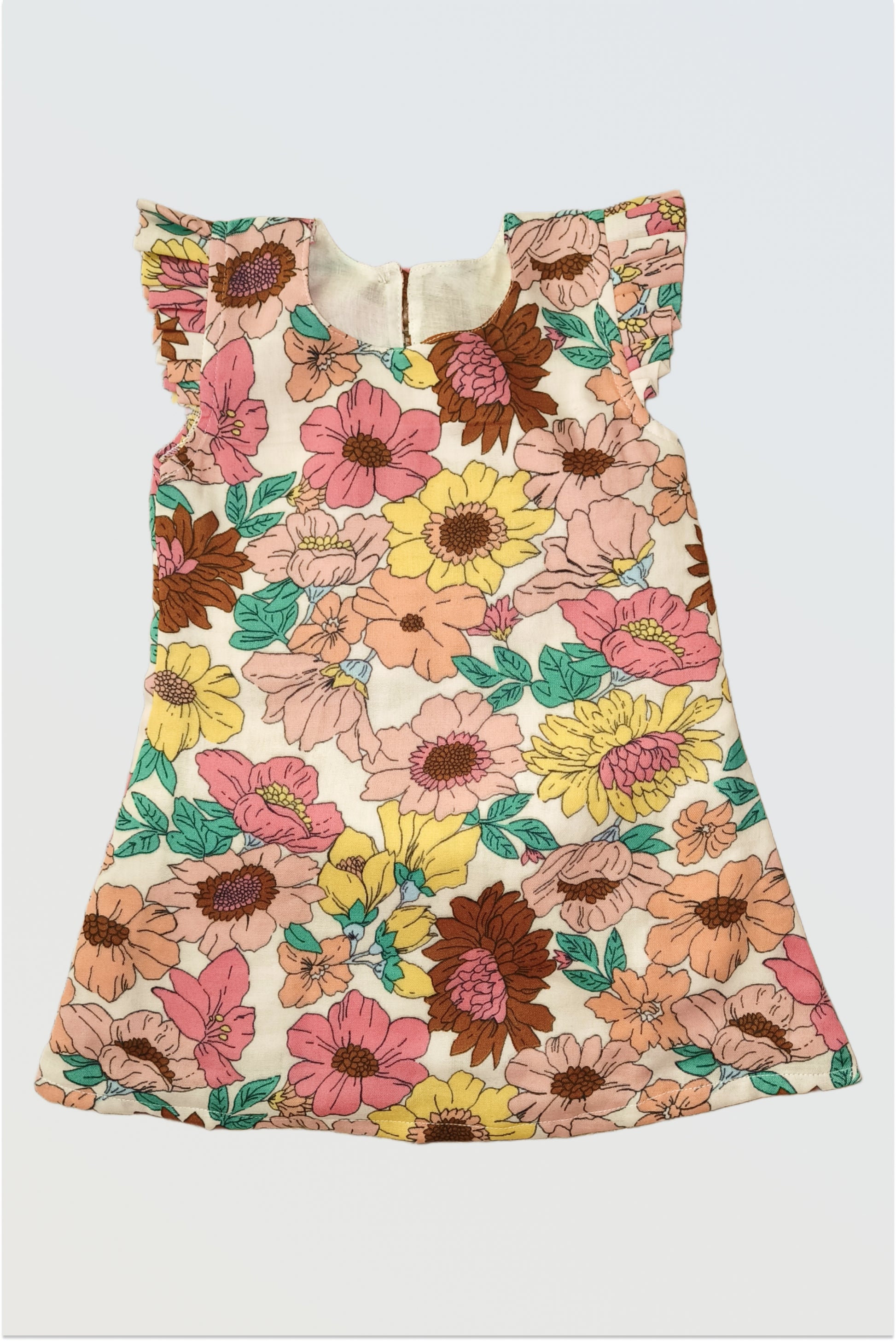 Summer Bloom vintage floral dress for girls with cream base and pink yellow brown botanical print with flutter sleeves