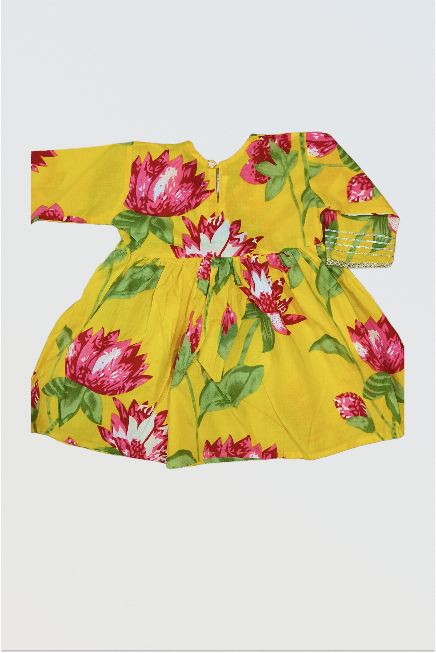 Back view of yellow floral kurta showing button closure and lace detail